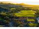 Aerial view of the golf course and surrounding mountain views at 10163 E Hualapai Dr # 2917, Scottsdale, AZ 85255