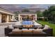 Stunning backyard with a sparkling pool, water feature, and fire pit at 10163 E Hualapai Dr # 2917, Scottsdale, AZ 85255