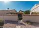 Pathway to backyard through gated entry at 10473 N 87Th Pl, Scottsdale, AZ 85258