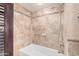 Clean bathroom with tile surround and shower/tub combo at 10473 N 87Th Pl, Scottsdale, AZ 85258