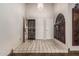 Bright entryway with tile floors and double doors at 10473 N 87Th Pl, Scottsdale, AZ 85258