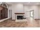 Living room fireplace with tile surround at 10473 N 87Th Pl, Scottsdale, AZ 85258