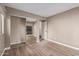 Bedroom with mirrored closet doors and wood-look tile floors at 10473 N 87Th Pl, Scottsdale, AZ 85258