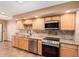 Kitchen features granite countertops and stainless steel appliances at 10473 N 87Th Pl, Scottsdale, AZ 85258