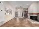 Spacious living room with fireplace and tile floors at 10473 N 87Th Pl, Scottsdale, AZ 85258