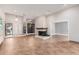 Living room with fireplace and tile flooring at 10473 N 87Th Pl, Scottsdale, AZ 85258