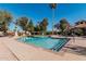 Community pool with steps and surrounding patio at 10473 N 87Th Pl, Scottsdale, AZ 85258