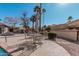 Poolside patio furniture with a table and chairs at 10473 N 87Th Pl, Scottsdale, AZ 85258