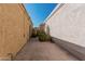 Landscaped side yard with pathway between buildings at 10473 N 87Th Pl, Scottsdale, AZ 85258