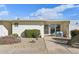 Charming mid-century modern condo with a well-manicured front yard at 10529 W Palmeras Dr, Sun City, AZ 85373