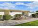 Inviting exterior with well-manicured landscaping and walkway at 10529 W Palmeras Dr, Sun City, AZ 85373