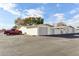 Property exterior, showing the garage and parking area at 10529 W Palmeras Dr, Sun City, AZ 85373