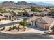 House with mountain views and desert landscaping at 10724 S Mustang Dr, Goodyear, AZ 85338