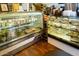 Bakery display case filled with pastries and other baked goods at 10724 S Mustang Dr, Goodyear, AZ 85338