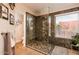 Spa-like bathroom with walk-in shower and pebble floor at 10724 S Mustang Dr, Goodyear, AZ 85338