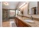 Elegant bathroom with granite countertops and walk-in shower at 10724 S Mustang Dr, Goodyear, AZ 85338