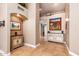 Bright entryway with decorative console tables and tile floors at 10724 S Mustang Dr, Goodyear, AZ 85338