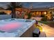 Relaxing hot tub with surrounding landscaping at 10724 S Mustang Dr, Goodyear, AZ 85338