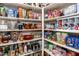 Large pantry with ample shelving for food and kitchen supplies at 10724 S Mustang Dr, Goodyear, AZ 85338