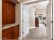 View of Primary bedroom from hallway with wooden cabinetry at 10724 S Mustang Dr, Goodyear, AZ 85338