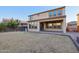 House backyard view with covered patio at 1132 W Santa Gertrudis Trl, San Tan Valley, AZ 85143