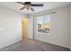 Bedroom with ceiling fan, closet, and window at 1132 W Santa Gertrudis Trl, San Tan Valley, AZ 85143