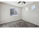 Cozy carpeted bedroom with window and neutral walls at 1132 W Santa Gertrudis Trl, San Tan Valley, AZ 85143