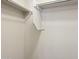 Built in shelving and hanging rods in this closet at 1132 W Santa Gertrudis Trl, San Tan Valley, AZ 85143