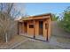 Wooden storage shed in backyard at 1132 W Santa Gertrudis Trl, San Tan Valley, AZ 85143