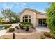 Landscaped backyard with a pool and patio at 11664 E Caron St, Scottsdale, AZ 85259