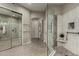 Spacious bathroom with walk-in shower, dual sinks, and updated fixtures at 11664 E Caron St, Scottsdale, AZ 85259