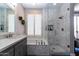 Spa-like bathroom with marble shower and soaking tub at 11683 N 135Th Pl, Scottsdale, AZ 85259