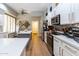 Modern kitchen with white cabinets and stainless steel appliances at 11683 N 135Th Pl, Scottsdale, AZ 85259