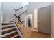 Elegant staircase with dark wood and white railings at 11683 N 135Th Pl, Scottsdale, AZ 85259