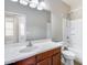 Neat and clean bathroom with a shower/tub combo and wood vanity at 11820 W Monte Lindo Ln, Sun City, AZ 85373