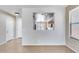 Dining area with a view into the kitchen at 11820 W Monte Lindo Ln, Sun City, AZ 85373