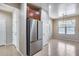 Stainless steel appliances and dark wood cabinets highlight this kitchen at 11820 W Monte Lindo Ln, Sun City, AZ 85373