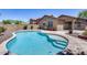 Inviting kidney-shaped pool with a large patio area at 11820 W Monte Lindo Ln, Sun City, AZ 85373