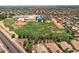 Aerial view of neighborhood with school and recreational fields at 11860 W Grant St, Avondale, AZ 85323