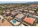 High-angle view of the home, pool, and surrounding area at 11860 W Grant St, Avondale, AZ 85323