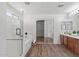 Elegant bathroom with a walk-in shower, soaking tub, and double vanity at 11860 W Grant St, Avondale, AZ 85323