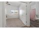 Bright bedroom with carpeted flooring and ceiling fan at 11860 W Grant St, Avondale, AZ 85323