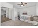 Spacious bedroom with carpeted floor and neutral wall colors at 11860 W Grant St, Avondale, AZ 85323