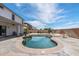 Inviting kidney-shaped pool with a spacious concrete patio at 11860 W Grant St, Avondale, AZ 85323