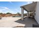 Covered patio overlooking a refreshing pool and spa at 11860 W Grant St, Avondale, AZ 85323