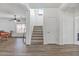 Carpeted staircase leading to the second floor of the home at 11860 W Grant St, Avondale, AZ 85323