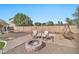 Backyard with fire pit and patio area at 11930 W Monroe St, Avondale, AZ 85323