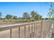 View of backyard with golf course access at 11930 W Monroe St, Avondale, AZ 85323