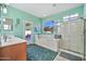 Bathroom features double sinks, a bathtub, and a shower at 11930 W Monroe St, Avondale, AZ 85323