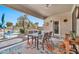 Outdoor patio with seating area and ceiling fan at 11930 W Monroe St, Avondale, AZ 85323